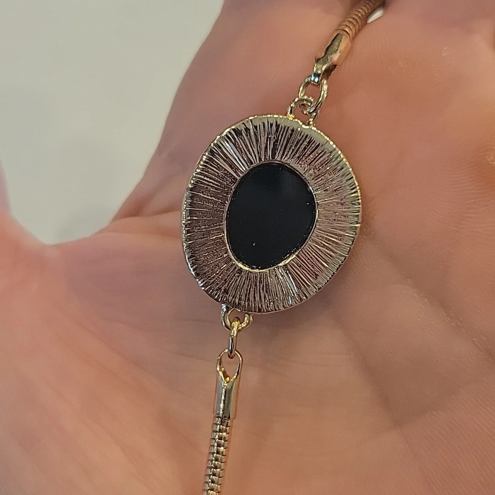 Perfect Condition Elegant Gold and Black Stone Bracelet